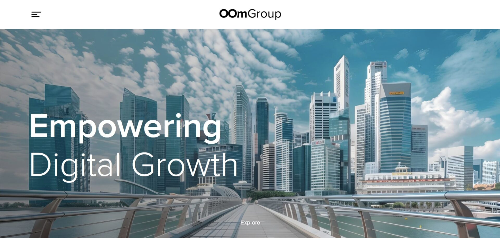 OOm Group homepage featuring the headline Empowering Digital Growth over a daytime cityscape background of Singapore's financial district with an Explore button at the bottom center.