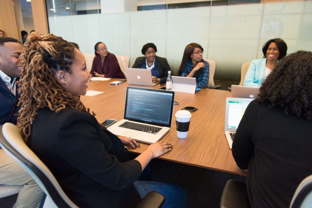 B2B business professionals discussing marketing priorities in a boardroom