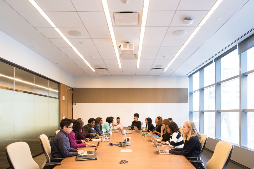 A professional team discussing marketing strategies in a bright, modern office space