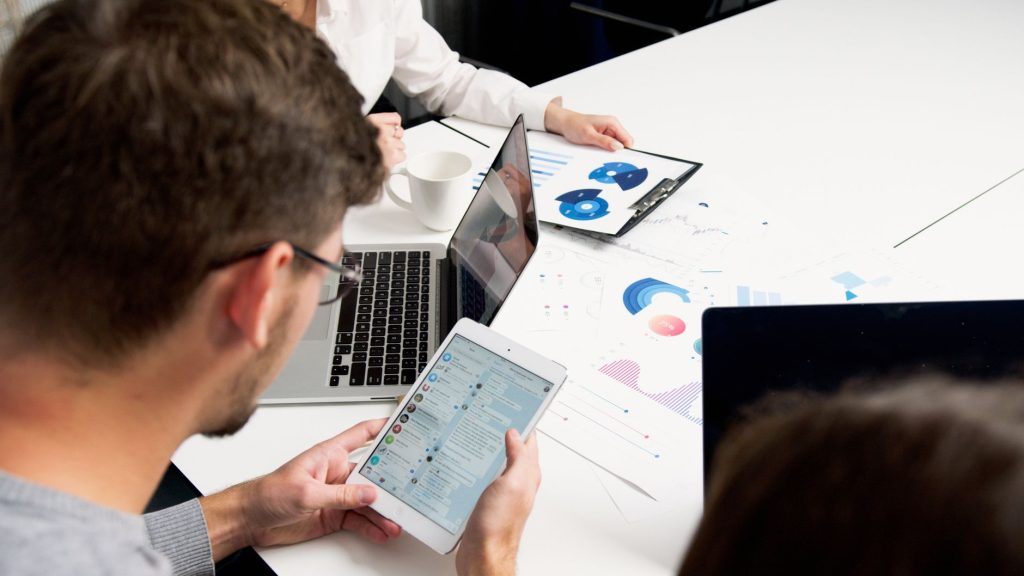 Marketing and sales professionals integrating account segments into CRM software