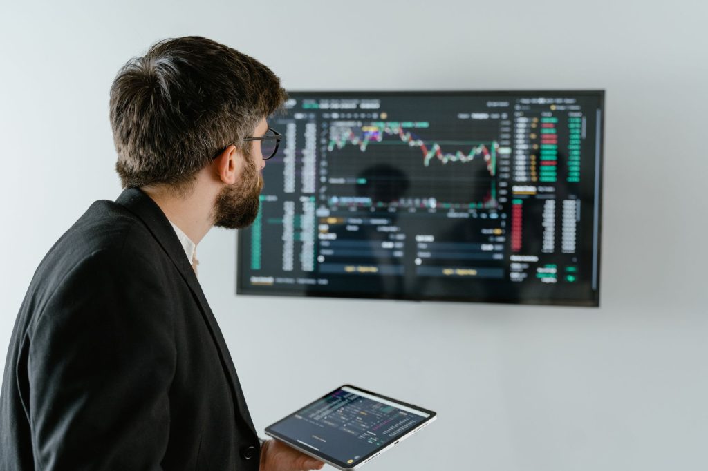 B2B marketing analyst examining target account signals and conversion data on screen
