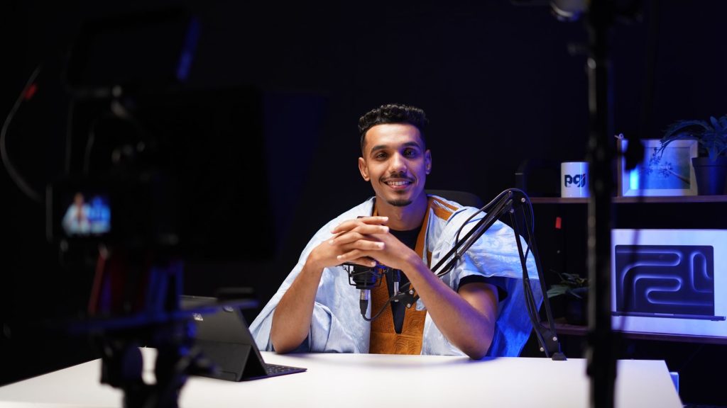 Practitioner sharing hands-on technical insights in a studio recording session