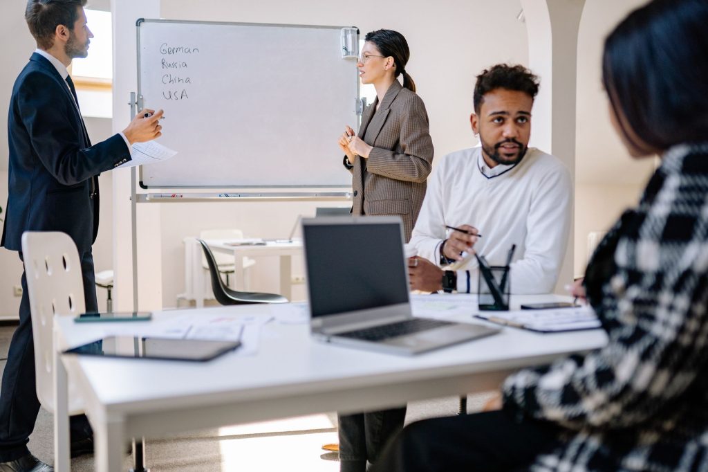 Internal subject matter expert sharing industry insights during an executive team workshop