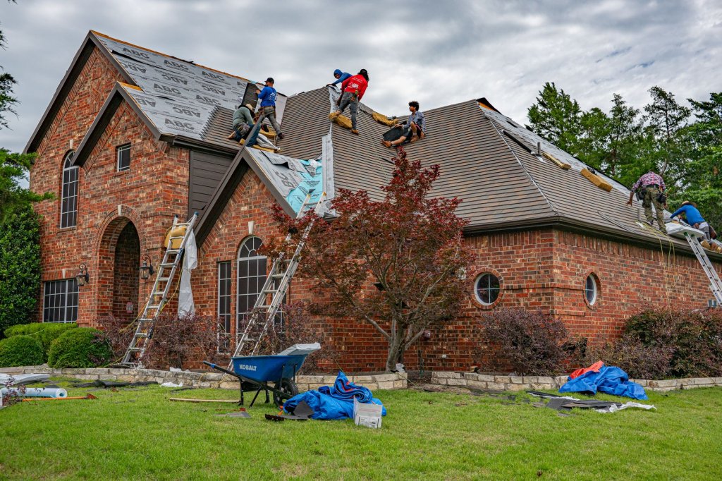 Modern house roof with newly installed shingles