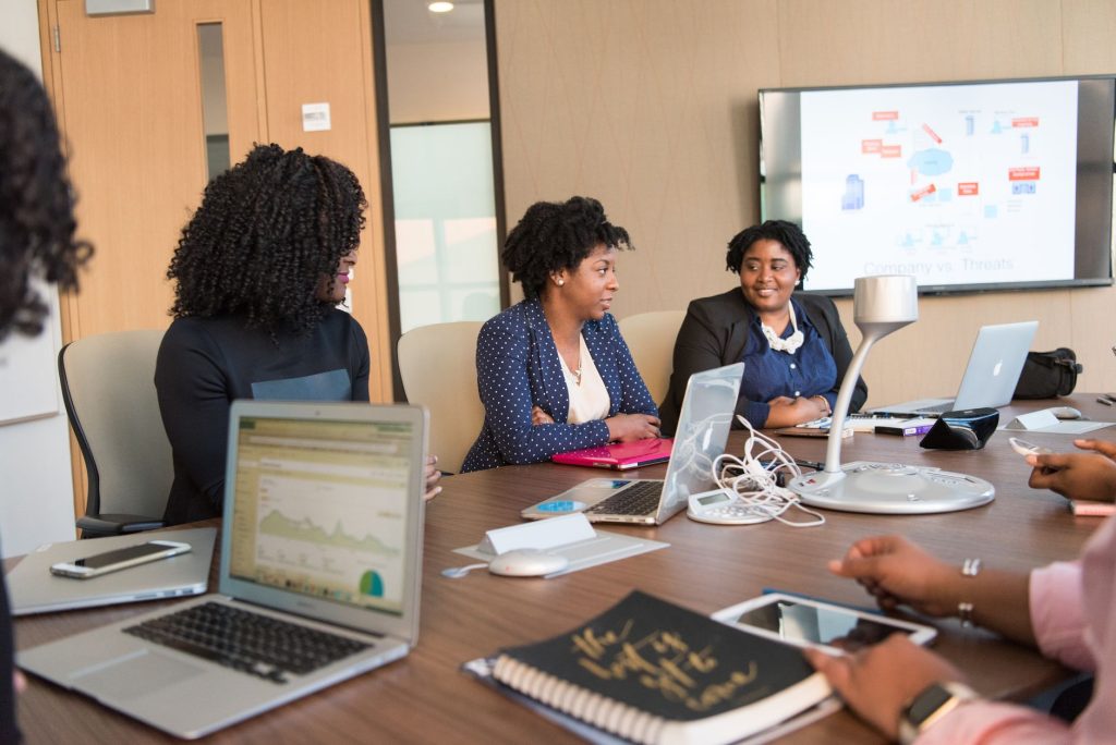 Enterprise marketing team coordinating governance and publishing approvals across brand channels