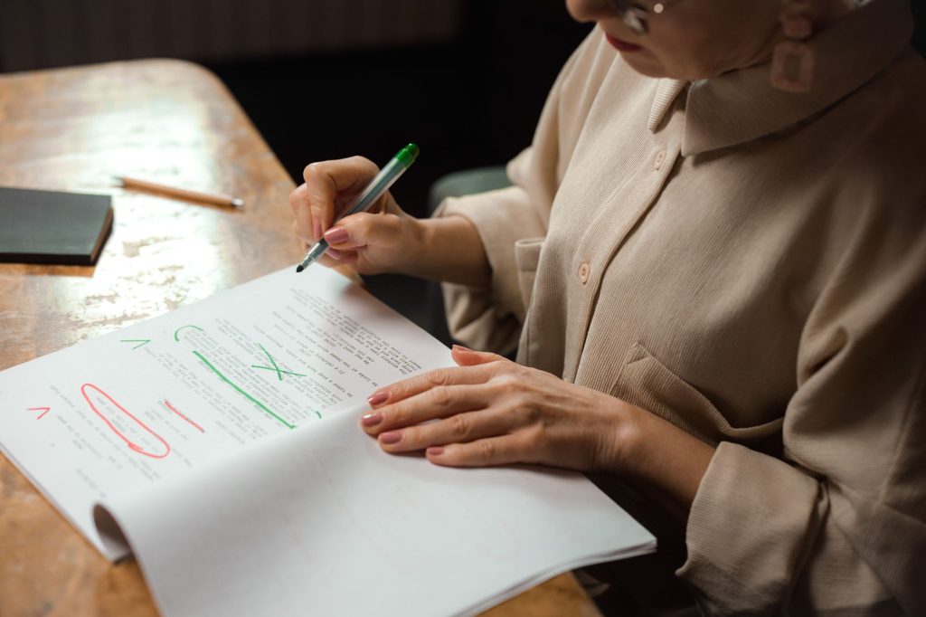 Social media strategist reviewing automated copy for brand tone and accuracy