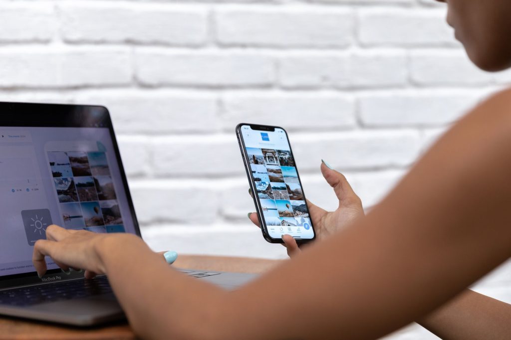 Content creator adjusting visual social media assets and drafts on screen