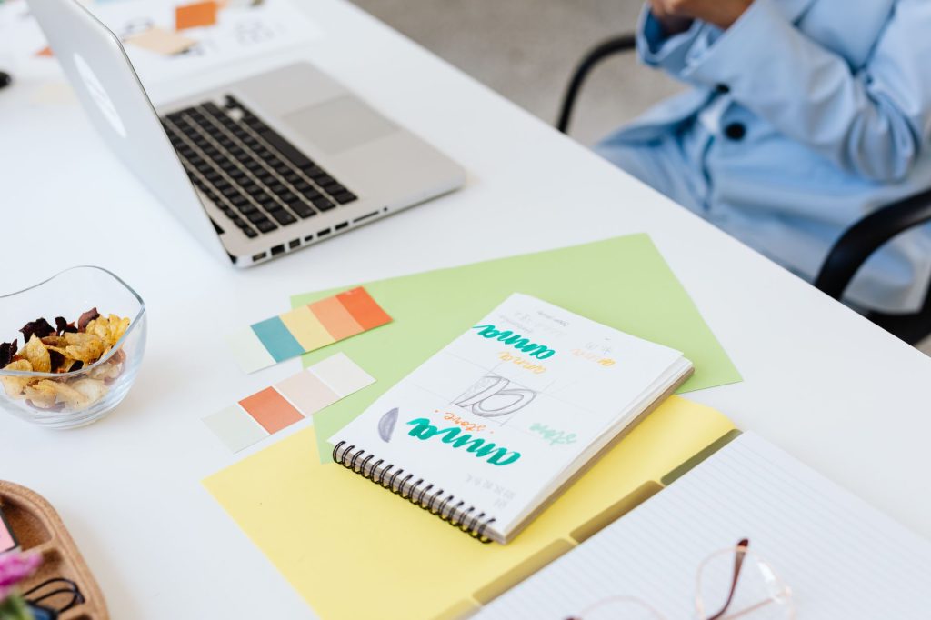Graphic designer working on visual marketing templates and branding assets