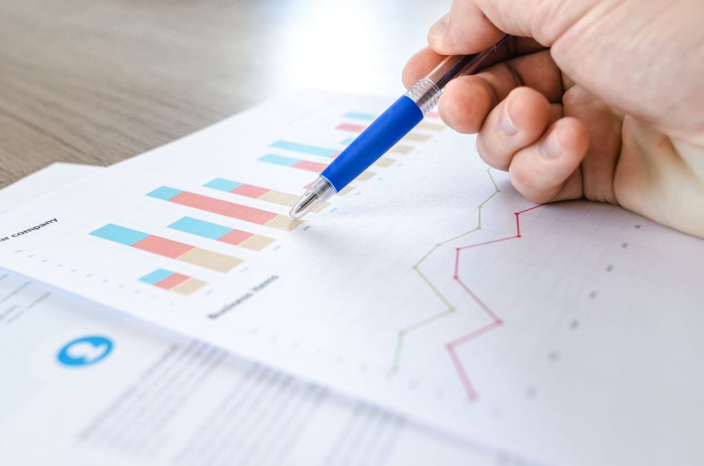 Specialist working across multi-screen social media dashboards and analytics workflows