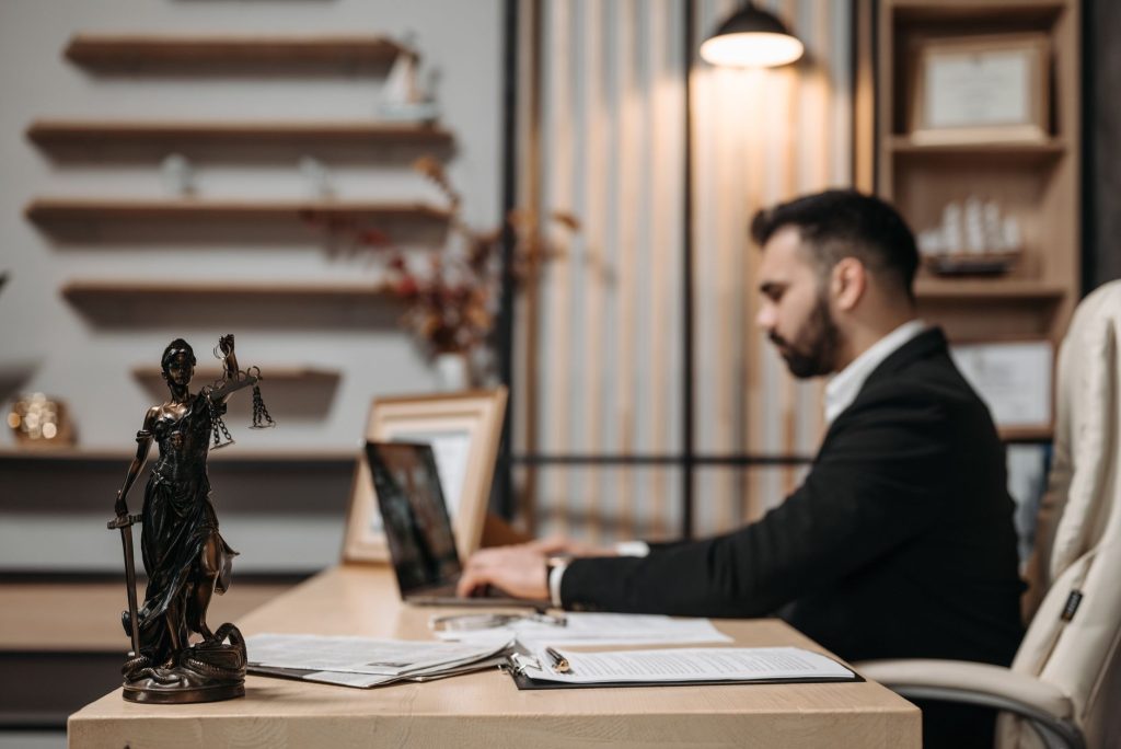 Law firm client intake specialist professionally responding to online inquiries and client reviews