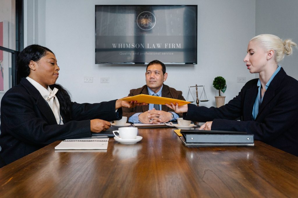 Two legal partners discussing long-term business development and referral growth in a modern office