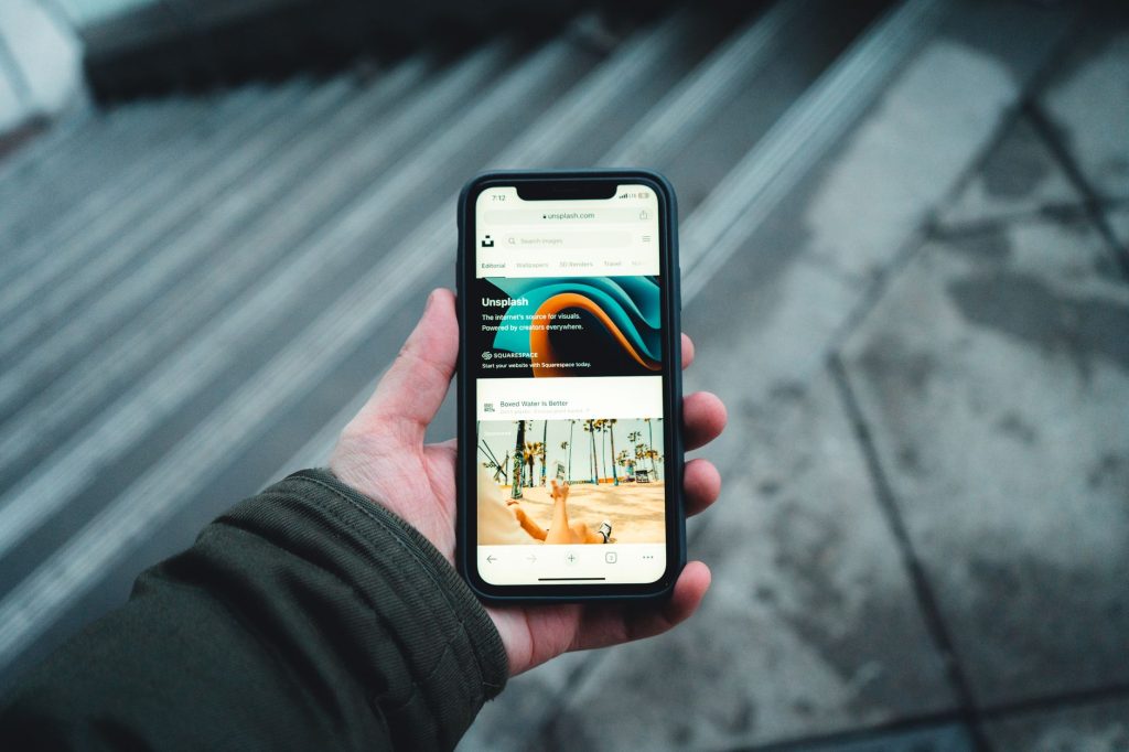 A prospective client browsing a construction company website on a phone