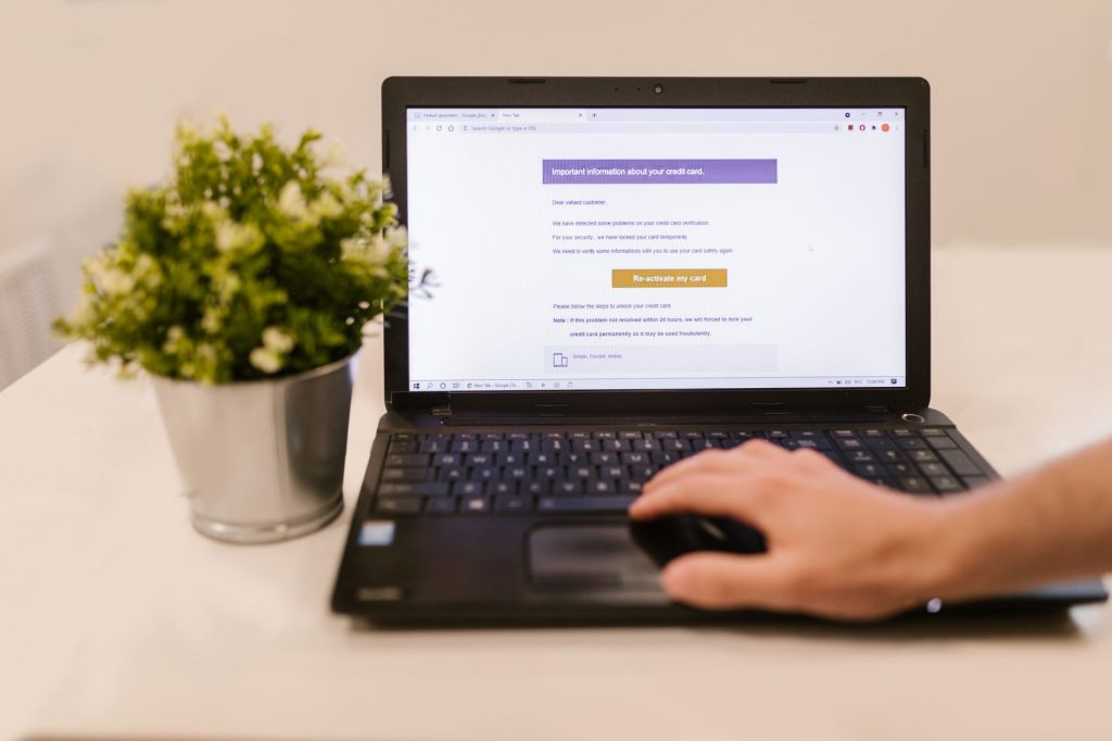 Fleet manager reviewing a business email on a laptop