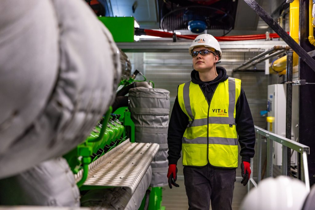 An engineer evaluating technical information while comparing solutions
