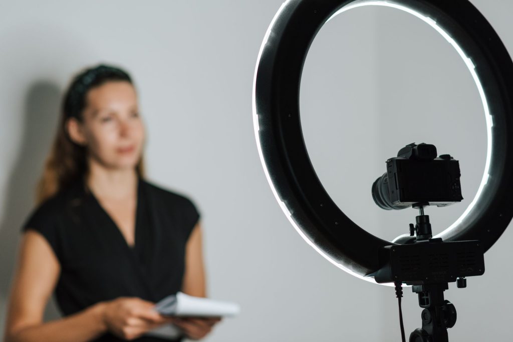 A lawyer prepares a video explainer alongside guides and client-focused articles.
