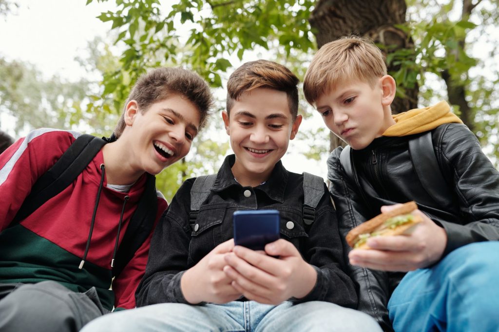 School team choosing social channels to reach parents, students, and supporters