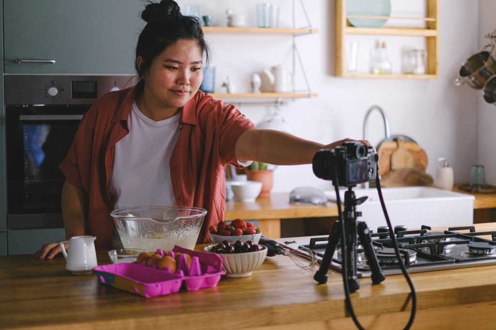 A creator films several social media posts in one focused session.