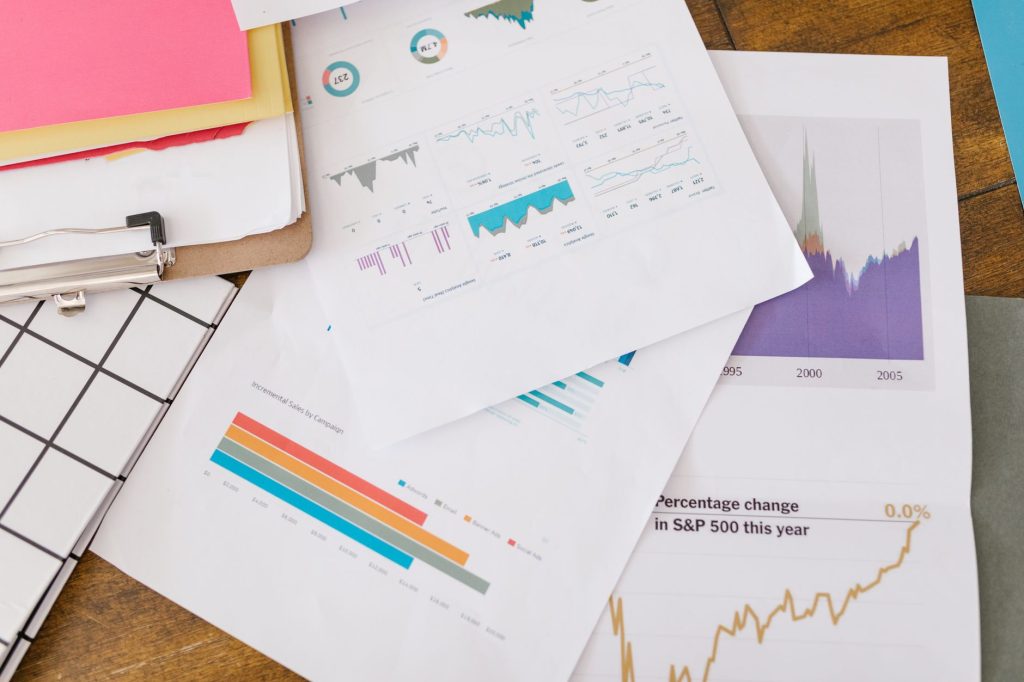 A marketer reviews social media analytics and customer comments.
